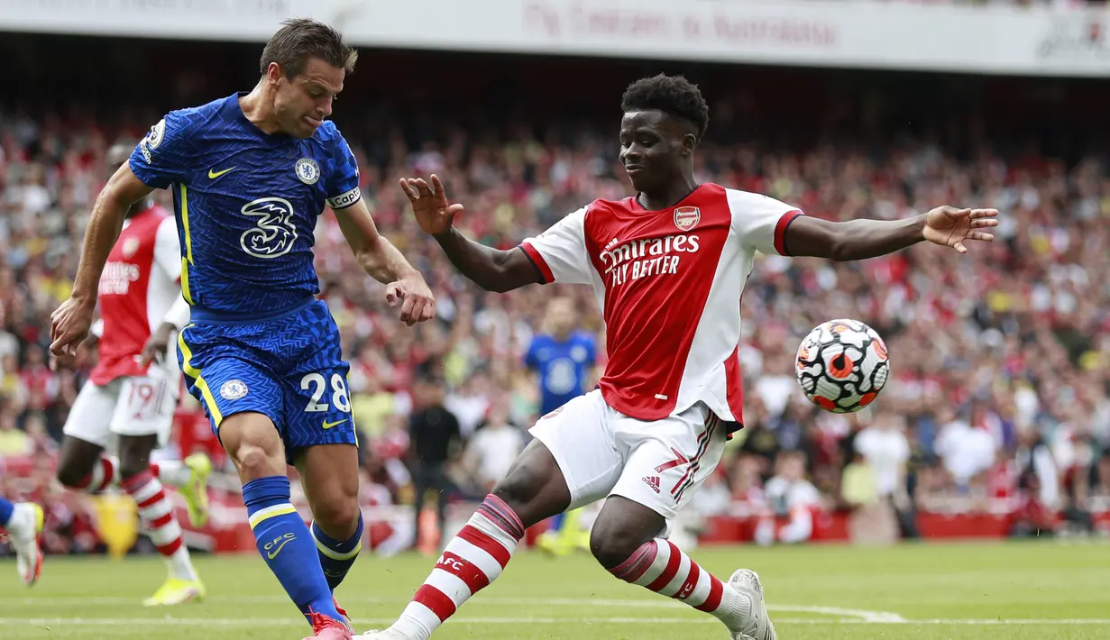 Di awal babak kedua, tepatnya di menit ke-51 Bukayo Saka hampir saja mencetak gol jika Edouard Mendy tidak sigap menepis sepakan kerasnya. (Foto: AP/Ian Walton)