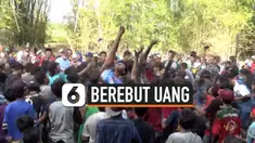 thumbnail tradisi berebut uang