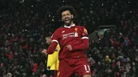 Winger Liverpool, Mohamed Salah, mencetak quattrick saat mengalahkan Watford 5-0 pada laga pekan ke-31 Premier League 2017-2018 di Stadion Anfield, Minggu (18/3/2018) dini hari WIB. (Anthony Devlin/PA via AP)