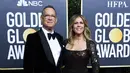 Aktor AS Tom Hanks dan isteri Rita Wilson tiba untuk Golden Globe Awards ke-77 di hotel The Beverly Hilton di Beverly Hills, California pada 5 Januari 2020. Tom Hanks dan istrinya Rita Wilson keduanya dinyatakan positif virus corona, kata aktor AS itu, Rabu lewat aku Twitternya. (AFP/Valerie Macon)