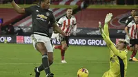 Anthony Martial mencetak gol pada pertandingan Liga Inggris antara Sheffield United dan MU di stadion Bramall Lane di Sheffield, Inggris, Kamis, 17 Desember 2020. Manchester United memenangkan pertandingan 3-2. (Foto AP / Rui Vieira, Kolam)