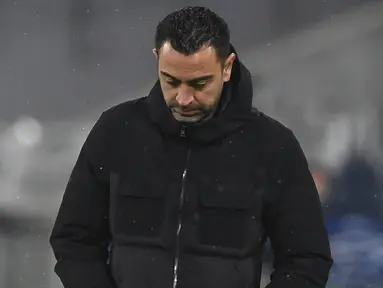 Hasil ini membuat Barcelona harus tersingkir dari Liga Champions dan terlempar ke Liga Europa. Skuad Xavi Hernandez hanya berada di peringkat ketiga Grup E dengan tujuh poin. (AFP/Christof Stache)