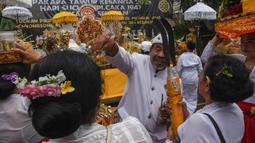 Jelang Hari Raya Nyepi, Tahun Baru Caka 1947 yang jatuh pada Sabtu 29 Maret 2025, Umat Hindu melakukan upacara Tawur Agung Kesanga. (merdeka.com/Arie Basuki)