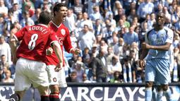 Cristiano Ronaldo total telah bertemu Manchester City sebanyak 15 kali saat berseragam Manchester United dalam dua periode dan Real Madrid. Ia mampu meraih 9 kemenangan, 2 hasil imbang dan 4 kali kalah dengan torehan 5 gol dan 2 assist. (AFP/Andrew Yates)