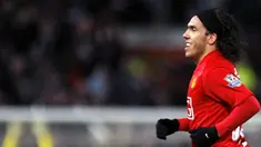 Manchester United's forward Carlos T&eacute;vez celebrates scoring against Blackburn Rovers during their English League Cup quarter final match at Old Trafford in Manchester, on December 3, 2008. AFP PHOTO/PAUL ELLIS