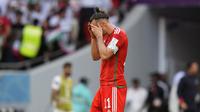 Ekspresi pemain Wales, Gareth Bale usai timnya dikalahkan Timnas Iran dalam pertandingan kedua Grup B Piala Dunia 2022 di&nbsp;Ahmad Bin Ali Stadium, Qatar, Jumat (25/11/2022). (AP Photo/Alessandra Tarantino)