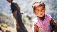 Wajah khas Himalaya pada seorang anak kecil (Via: boredpanda.com)