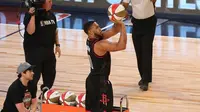 Eric Gordon memenangi kontes tembakan tiga poin pada NBA All-Star 2017 mengalahkan Kyrie Irving.(NBA.com)