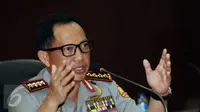 Kapolri Jenderal Tito Karnavian menjawab pertanyaan terkait penetapan Basuki Tjahaja Purnama (Ahok) sebagai tersangka kasus penistaan agama di Jakarta, Rabu (16/11). Ahok ditetapkan tersangka usai gelar perkara, (15/11). (Liputan6.com/Helmi Fithriansyah) 