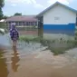 Hujan lebat di Palembang picu banjir hingga menewaskan bocah (Liputan6.com / Nefri Inge)