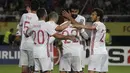 Para pemain Spanyol merayakan gol Diego Costa saat melawan Makedonia pada kualifikasi Piala Dunia 2018 grup G di Philip II National Stadium, Skopje, MaKedonia, (11/6/2017). (AP/Boris Grdanoski) 