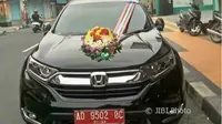 Mobil dinas pejabat di Klaten dihias untuk mobil pengantin.(Istimewa/Solopos.com)