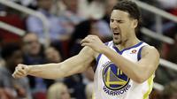 Selebrasi Klay Thompson saat lawan Rockets (AP)