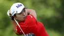 Pegolf Jin Young Ko bersiap melakukan pukulan pada putaran final Amerika Terbuka di Trump National Golf Club-New Jersey, 16 Juli 2017 waktu setempat. Sejumlah pegolf cantik ikut serta pada turnamen golf ini. (Elsa/Getty Images/AFP)