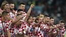 Para pemain Kroasia melakukan selebrasi usai pertandingan playoff perebutan juara ketiga Piala Dunia 2022 melawan Maroko di Khalifa International Stadium di Doha, Qatar, Sabtu (17/12/2022). Kroasia sudah tiga kali naik podium dalam enam kali keikutsertaannya di turnamen akbar piala dunia. (AP Photo/Frank Augstein)