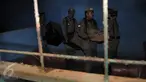 Petugas Satpol PP mengevakuasi barang saat eksekusi salah satu bangunan di kawasan hiburan malam Alang-alang di Kelurahan Buaran, Tangsel, Kamis (12/5). Bangunan mulai dari berbahan papan hingga permanen, dibongkar petugas. (Liputan.com/Helmi Afandi)
