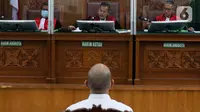 Mantan Kasubbagriksa Baggak Etika Rowabprof Divisi Propam Polri Baiquni Wibowo menjalani sidang pembacaan putusan di PN Jakarta Selatan, Jumat (24/2/2023). Majelis hakim PN Jaksel menilai Baiquni telah terbukti turut serta melakukan obstruction of justice atau perintangan penyidikan terkait penanganan perkara pembunuhan berencana Nofriansyah Yosua Hutabarat alias Brigadir J. (Liputan6.com/Herman Zakharia)