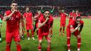 Para pemain Turki merayakan kemenangan atas Prancis pada laga kualifikasi Piala Eropa 2020 di Stadion Buyuksehir Belediyesi, Minggu (9/6). Turki menang 2-0 atas Prancis. (AFP/Adem Altan)