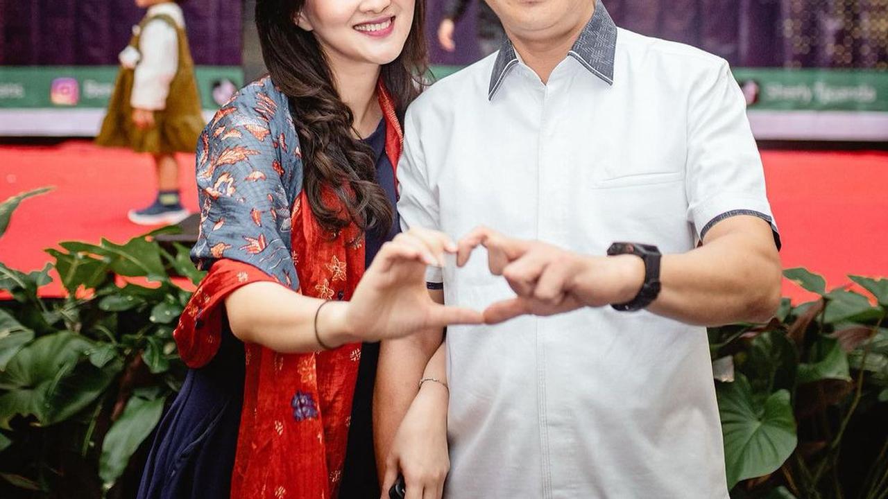 Benny Laos dan istrinya