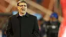 Gaya pelatih Paraguay Gerardo Martino memberi instruksi kepada para pemainnya di laga semifinal Copa America 2011 melawan Venezuela di Malvinas Argentinas Stadium, 20 Juli 2011. AFP PHOTO / ALEJANDRO PAGNI