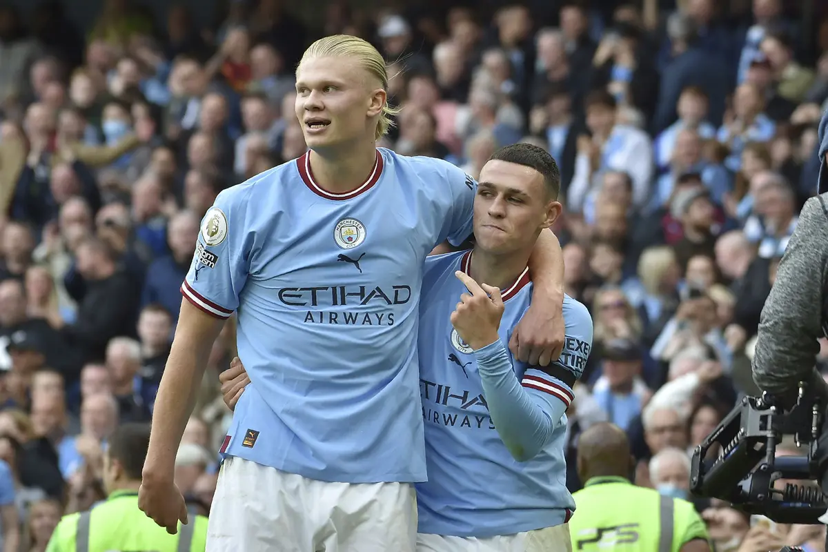 Foto: Aksi Memukau Erling Haaland dan Phil Foden Saat Man City Bantai MU di Liga Inggris, Keduanya Cetak Rekor Baru
