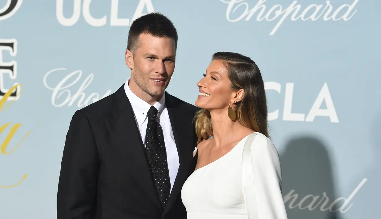 <p>Tom Brady, quarterback juara Super Bowl tujuh kali yang saat ini bermain untuk Tampa Bay Buccaneers, dan istrinya, Gisele &uuml;ndchen, seorang model fesyen, telah menyewa pengacara perceraian. (Kein Winter/Getty Images/AFP, File)</p>