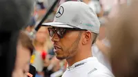 Pebalap Mercedes, Lewis Hamilton, gagal merebut pole position pada F1 GP Jerman di Sirkuit Hockenheim, Sabtu (30/7/2016). (EPA/Ronald Wittek)