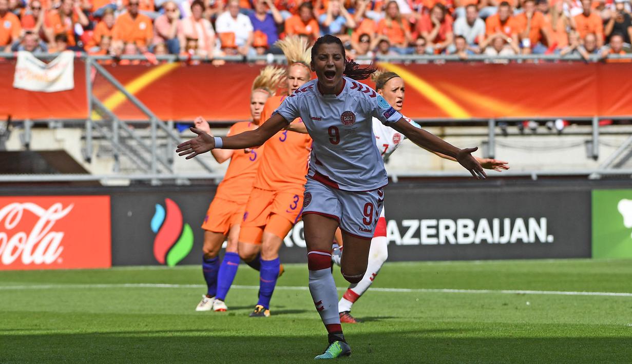 Nadia merupakan pilar penting Timnas Putri Denmark sejak 2009 hingga kini. Total Nadia sudah mencetak 32 gol dari 66 penampilan di timnas. (Foto: AFP/John Thys)