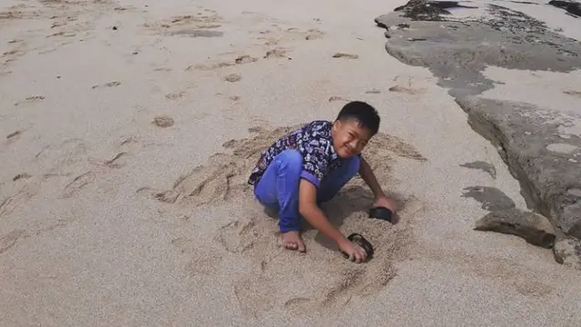Wahyu Nizam Arden Abhista penyandang Down syndrome asal Malang. Foto: Dok. Pribadi.
