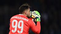 Kiper AC Milan, Gianluigi Donnarumma. (MIGUEL MEDINA / AFP)
