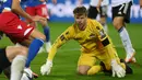 Benjamin Buchel. Kiper Liechtenstein berusia 32 tahun yang kini memperkuat FC Vaduz, mencatat 71 kali saves dan kebobolan 30 gol dari total 9 laga di Kualifikasi Piala Dunia 2022 Grup J. Dengan koleksi 1 poin dari 10 laga, Liechtenstein berada di posisi ke-6 alias juru kunci. (AFP/Christof Stache)