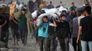 Kepala Badan Bantuan dan Pekerjaan Perserikatan Bangsa-Bangsa untuk Pengungsi Palestina (UNWRA) menyebut lokasi itu atau titik distribusi bantuan sebagai perangkap maut. (Eyad BABA/AFP)