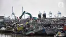 Suasana di Perkampungan Nelayan Kalibaru, Cilincing, Jakarta Utara, Rabu (29/6/2022). Berdasarkan data Dinas Ketahanan Pangan, Kelautan, dan Pertanian (DKPKP) Provinsi DKI Jakarta, jumlah produksi perikanan tangkap dan budidaya di Ibu Kota pada tahun 2020 masing-masing sebanyak 107.828,84 dan 3.869,48 ton. (merdeka.com/Iqbal S. Nugroho)