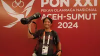 Ketika Fotografer Media Official PON XXI Aceh-Sumut 2024 Risky Cahyadi Jadi Idola Atlet Gulat