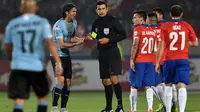 Sandro Ricci, wasit Cile vs Uruguay (AFP/Rodrigo Arangua)