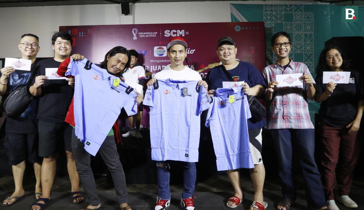 Tidak hanya nonton bareng saja, ada hiburan musik, dan kuis berhadiah total jutaan rupiah bagi para penonton yang hadir di lokasi. (Bola.com/M iqbal Ichsan)