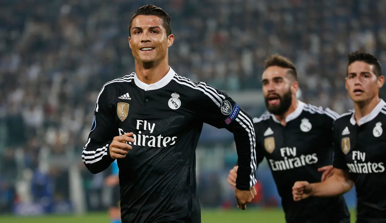 Penyerang Real Madrid, Cristiano Ronaldo merayakan selebrasi usai mencetak gol ke gawang Juventus pada leg pertama babak semifinal Liga Champions di Juventus Stadium, Rabu (6/5/2015). Juventus menang 2-1 atas Real Madrid. (Reuters/Sergio Perez)