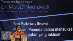 Mantan Menteri Keuangan, Sri Mulyani Indrawati saat memberi kuliah umum di kampus UI Depok, Selasa (26/7). Sri menilai percepatan pembangunan infrasturuktur yang dilakukan pemerintah Indonesia sebagai langkah tepat. (Liputan6.com/Helmi Fithriansyah)
