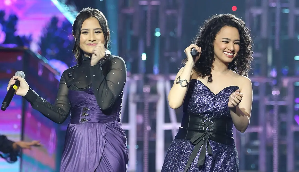 "Prilly itu punya warna suara yang bagus dan dia bisa membawakan lagu Untuk Sahabat dengan baik. Jadi tadi, kami tidak ada kesulitan sama sekali saat berduet," kata Wizzy. (Bambang E. Ros/Bintang.com)