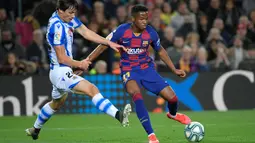 Ansu Fati menjalani debut bersama Barcelona di Liga Spanyol musim 2019-2020 pada laga kontra Real Betis, 25 Agustus 2019. (AFP/Lluis Gene)