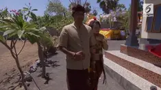 Walaupun memiliki resiko tinggi, Gede Bagus Ariska dan Yesi Fitriani menikah ditengah area berbahaya Gunung Agung.
