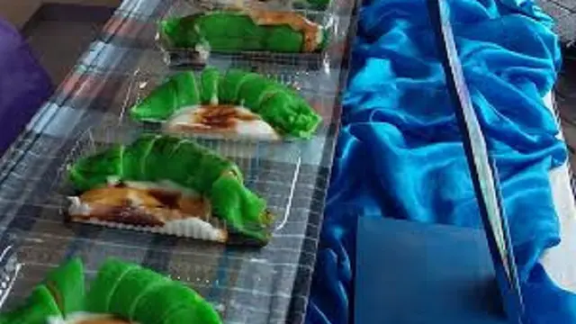 20151128-Makassar Pecahkan Rekor Muri Pisang Ijo Terpanjang dan Terbanyak