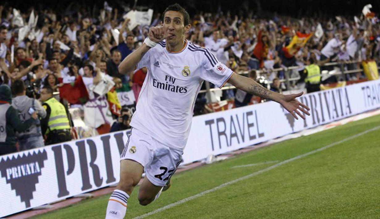 Gelandang Real Madrid, Angel Di Maria merayakan gol ke gawang Barcelona pada laga Copa del Rey di Mestalla, Spanyol, Rabu (16/4/2014). Di Maria pindah dari Madrid ke MU dengan memecahkan rekor transfer Liga Inggris. (AFP Photo/Cesar Manso)