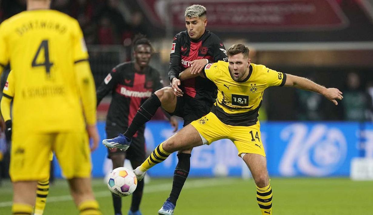 Exequiel Palacios tampil memukau di lini tengah Bayer Leverkusen. Gelandang bertahan peraih juara dunia bersama Argentina ini memang andal dalam penguasaan bola dan pandai mengatur irama serangan. (AP Photo/Martin Meissner)