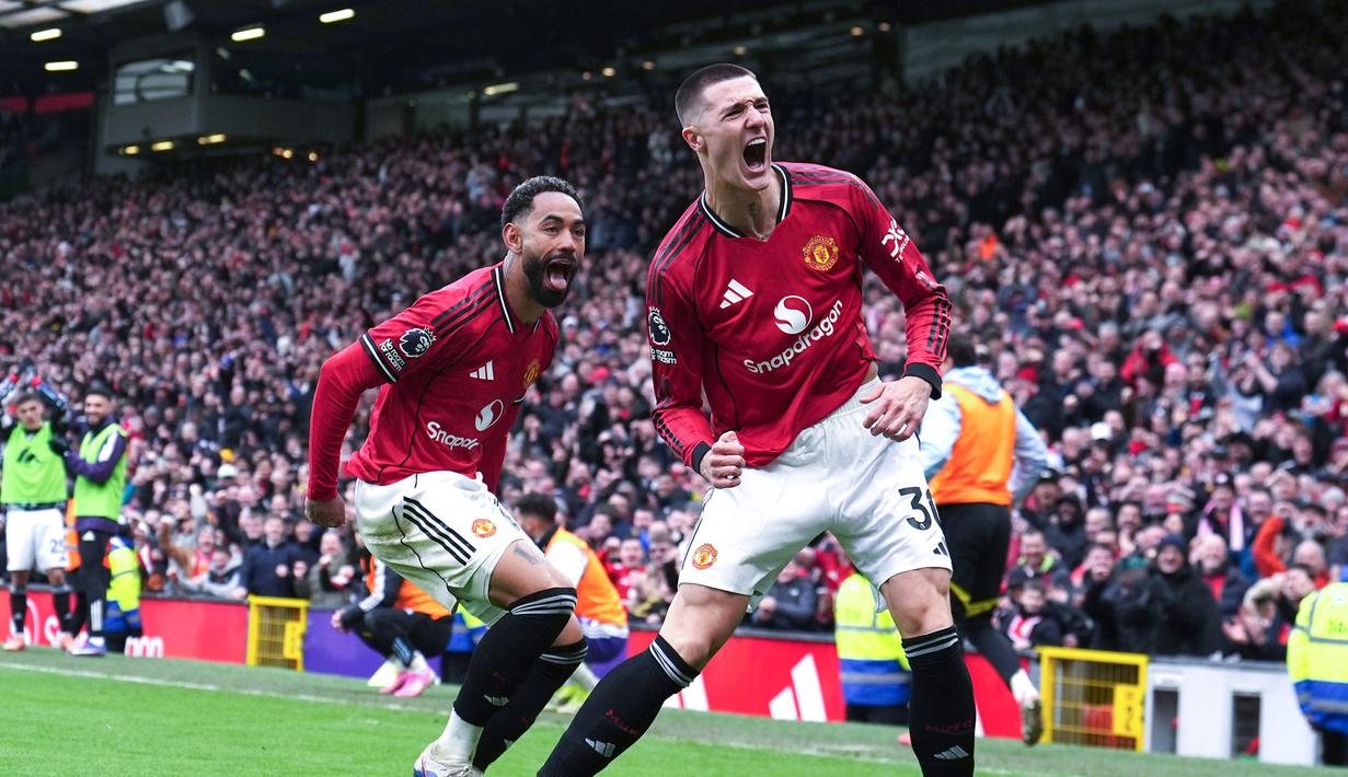 Dalam pertandingan tersebut, Manchester United memastikan kemenangan 3-1 berkat gol pada babak kedua yang dicetak Casemiro, Matheus Cunha, dan Benjamin Sesko. (Martin Rickett/PA via AP)