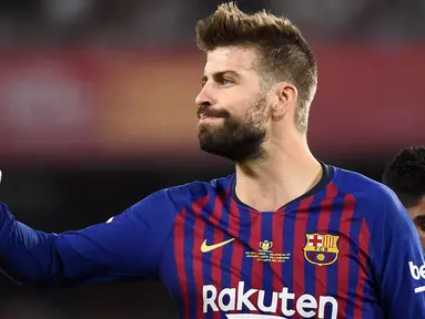 Gerard Pique rela memotong gajinya demi klub yang telah ia bela selama 13 tahun lamanya. Mantan pemain MU tersebut mengungkapkan bahwa dirinya bersedia dipotong gajinya sebesar 50 persen atau dari 38 juta euro setahun menjadi 19 juta euro setahun. (Foto: AFP/Jose Jordan)