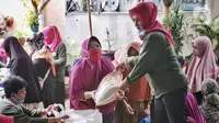 Warga menerima sambako Bantuan Pangan Non Tunai (BPNT) di RW 01 Kelurahan Gaga,Larangan, Kota Tangerang, Banten, Rabu (24/2/2021). Bantuan tersebut senilai Rp 200.000 yang dibelanjakan 12 kg beras, 1 kg telur, tempe, sayuran dan buah. (Liputan6.com/Angga Yuniar)