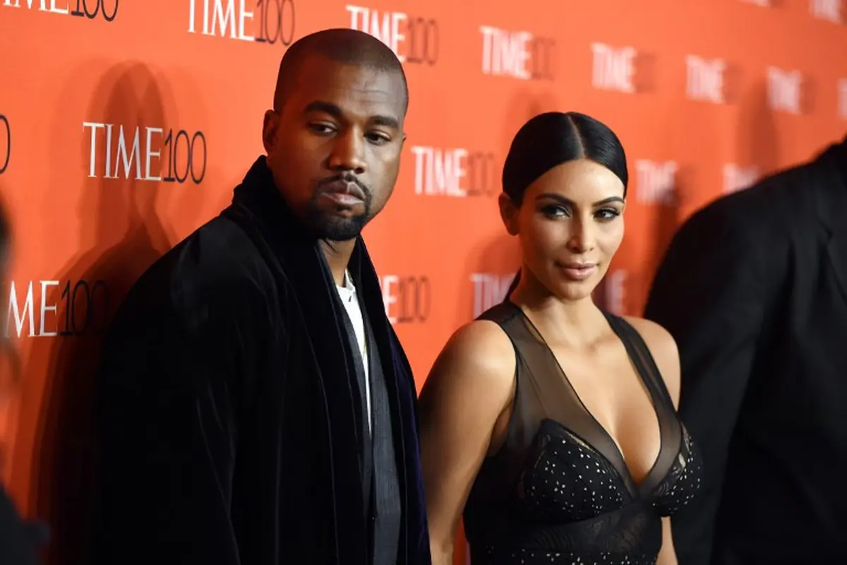 Kim Kardashian dan Kanye West tuai komentar pedas. (Foto: AFP)