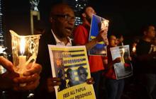 Aksi lilin solidaritas untuk Papua