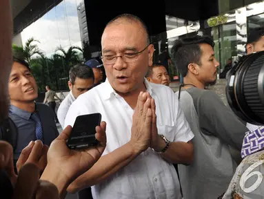 Rizal Abdullah usai menjalani pemeriksaan di Gedung KPK, Jakarta, Rabu (17/12/2014). (Liputan6.com/Miftahul Hayat)